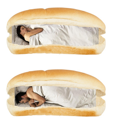 Man and woman sleeping in hot dog bed