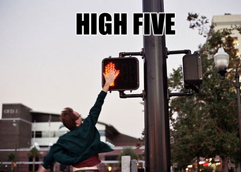 High five a street sign